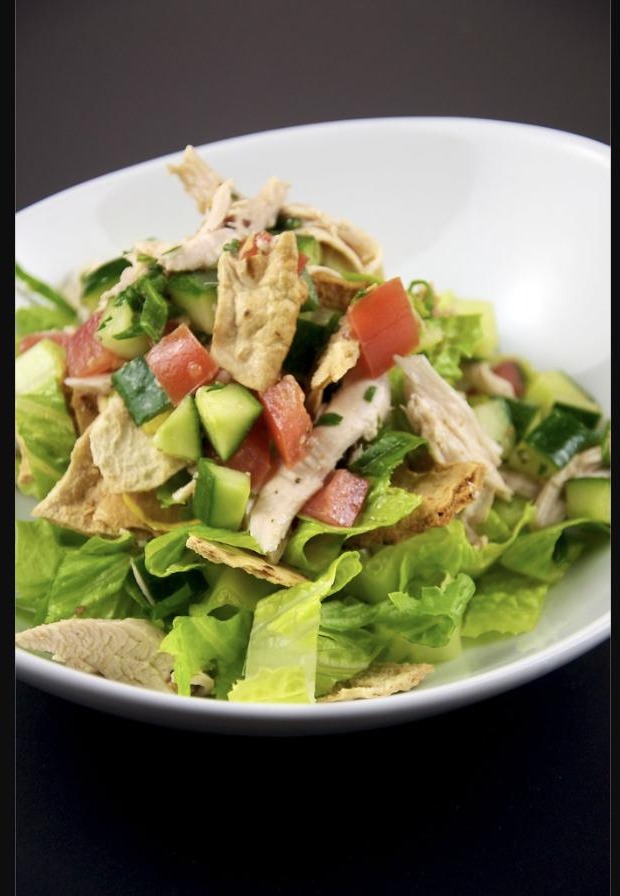 A balanced plate with a lean protein portion and vegetables